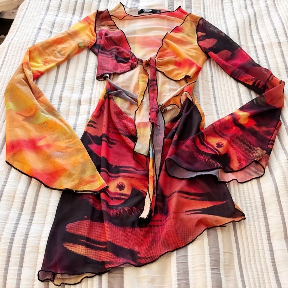 Jaded London cut out mini pixie dress in multi print long sleeve flared